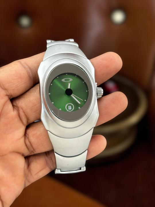 Oakley Time Bomb Red Dial – Futuristic Matte Titanium Watch